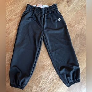 Kids baseball pants. Never worn. XS